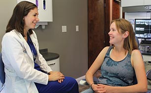 Dr. Kristen Vilardi-Shanley with patient.